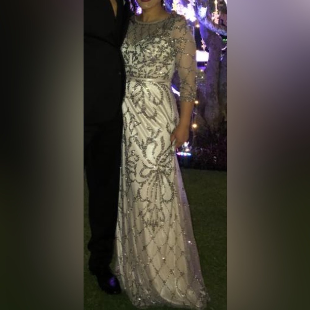 Classy and sparkly dress. Never see a nothing like this in store.